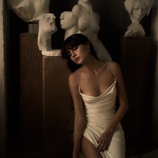 Telegram profile photo for Statue of a Woman.