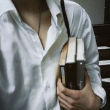 Telegram profile photo for feel comfy & .. writing a poem, faint near gloomy lights. ᡣ𐭩