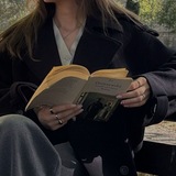 Telegram profile photo for a girl with her books